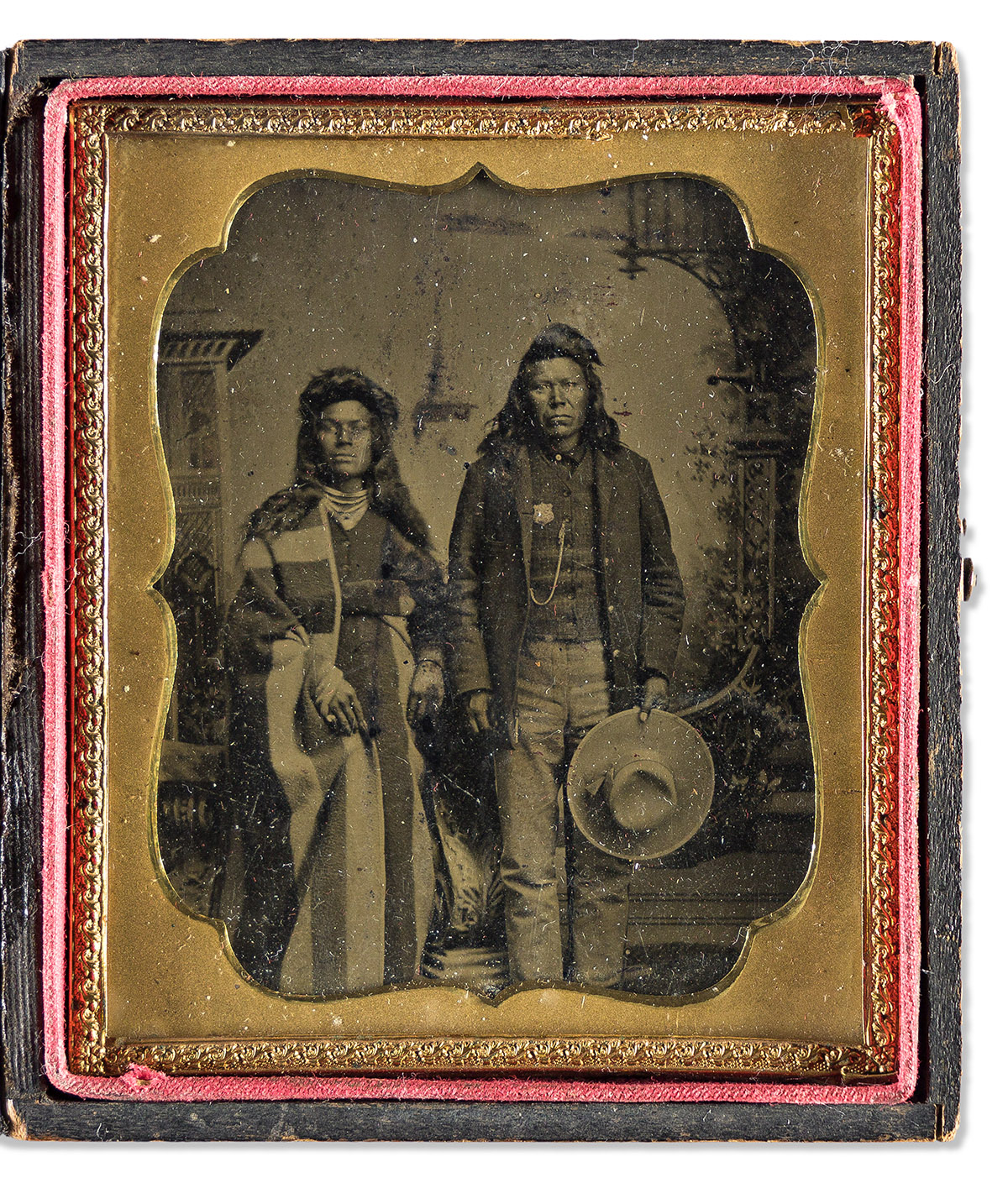(AMERICAN INDIANS.) Portrait of a tribal policeman and his wife.